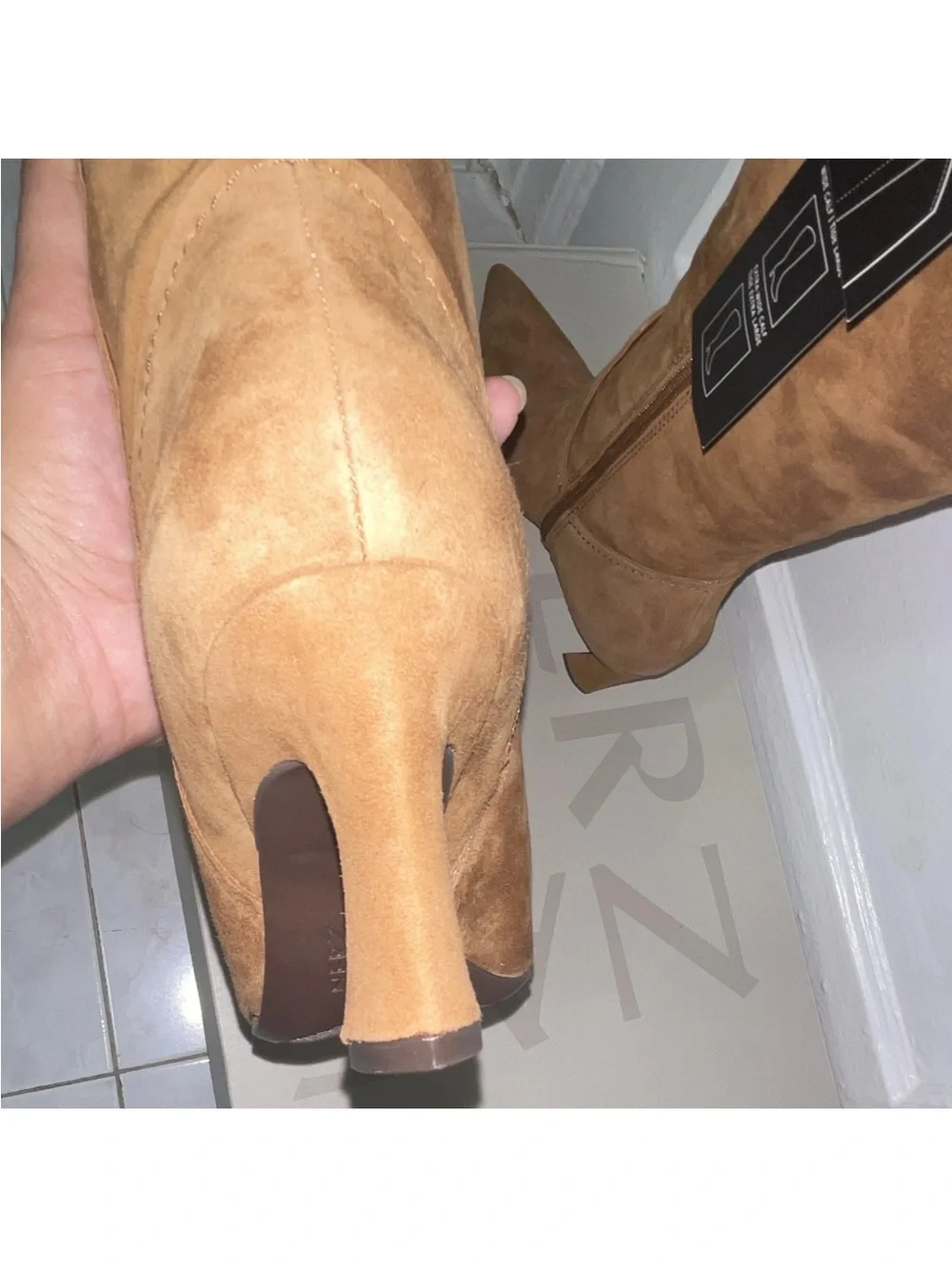 Naturalizer over knee